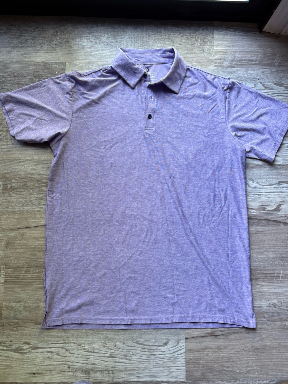 Purple polo shirt with a relaxed fit